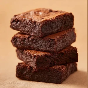Delicious homemade brownies displayed on a white plate