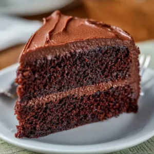 Delicious homemade chocolate cake topped with creamy frosting