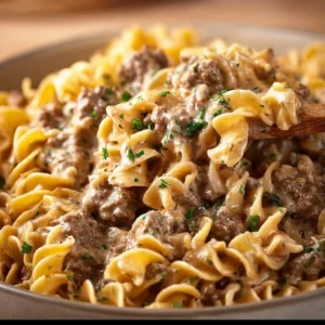Simple ground beef stroganoff served in a bowl with creamy sauce and mushrooms