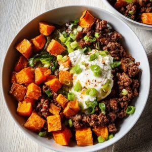 Delicious Sweet Potato Beef Bowl topped with Hot Honey and Cottage Cheese
