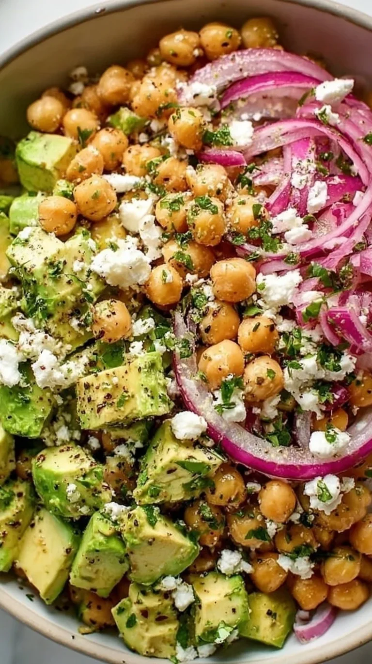 Chickpea feta avocado salad with fresh vegetables and dressing