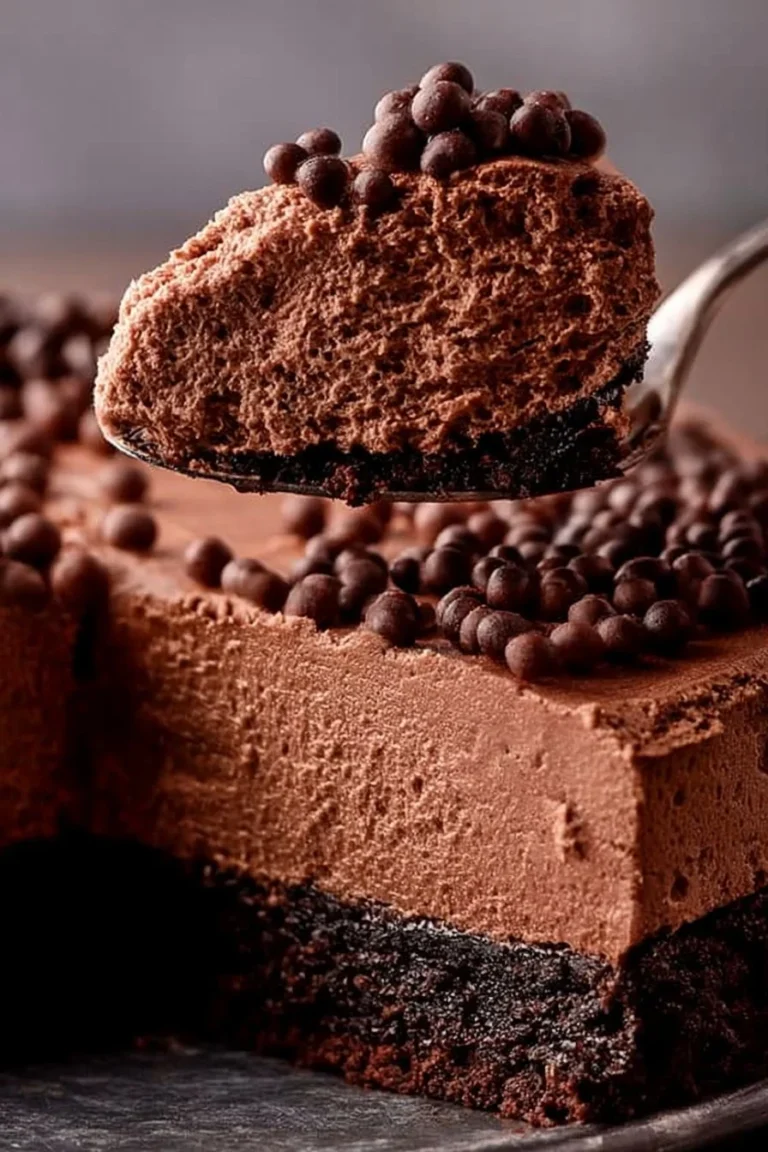 Delicious Chocolate Mousse Cake with a rich chocolate topping