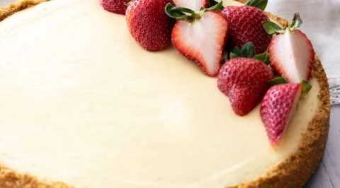 Slice of delicious homemade cheesecake on a plate